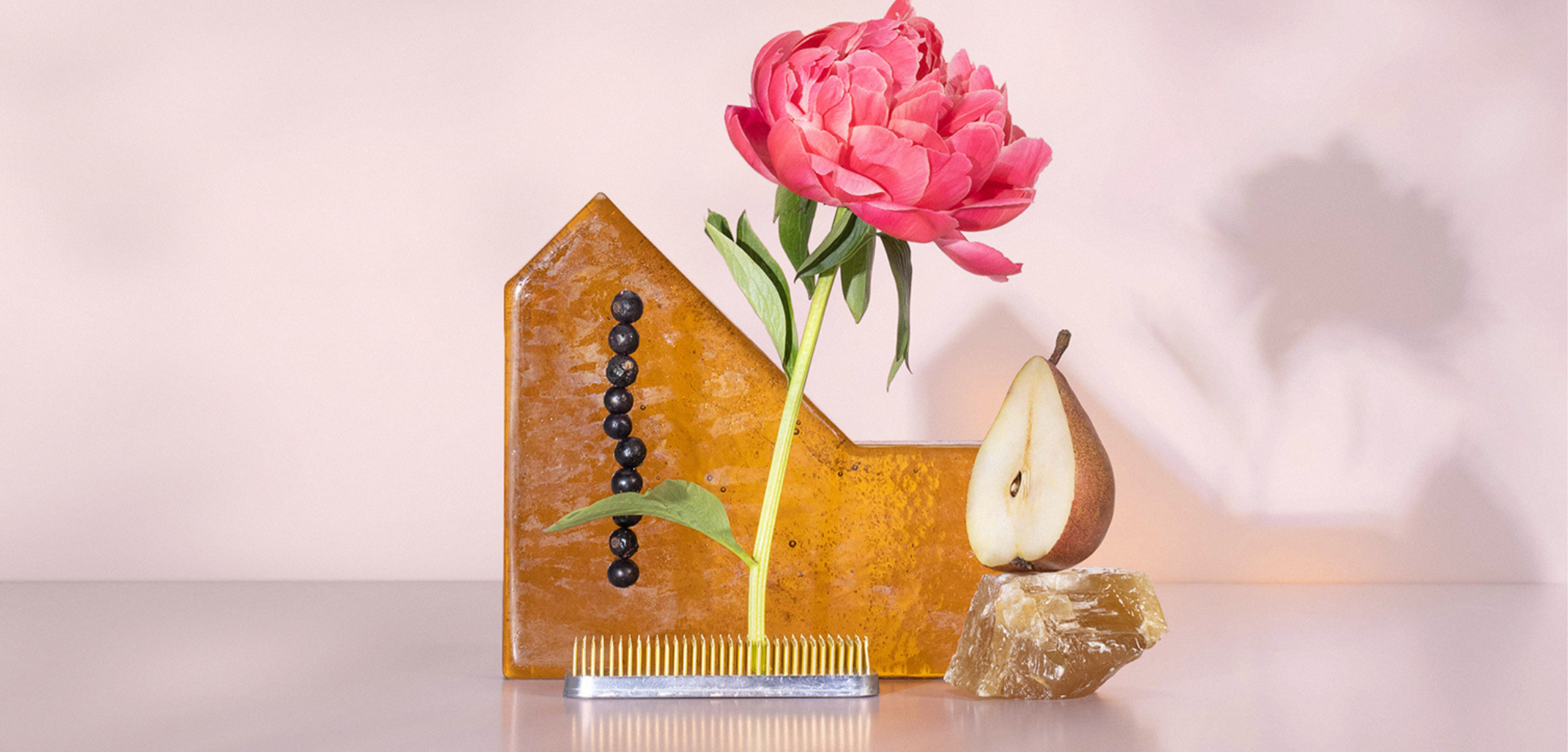 Queen Bee perfume collection with flower