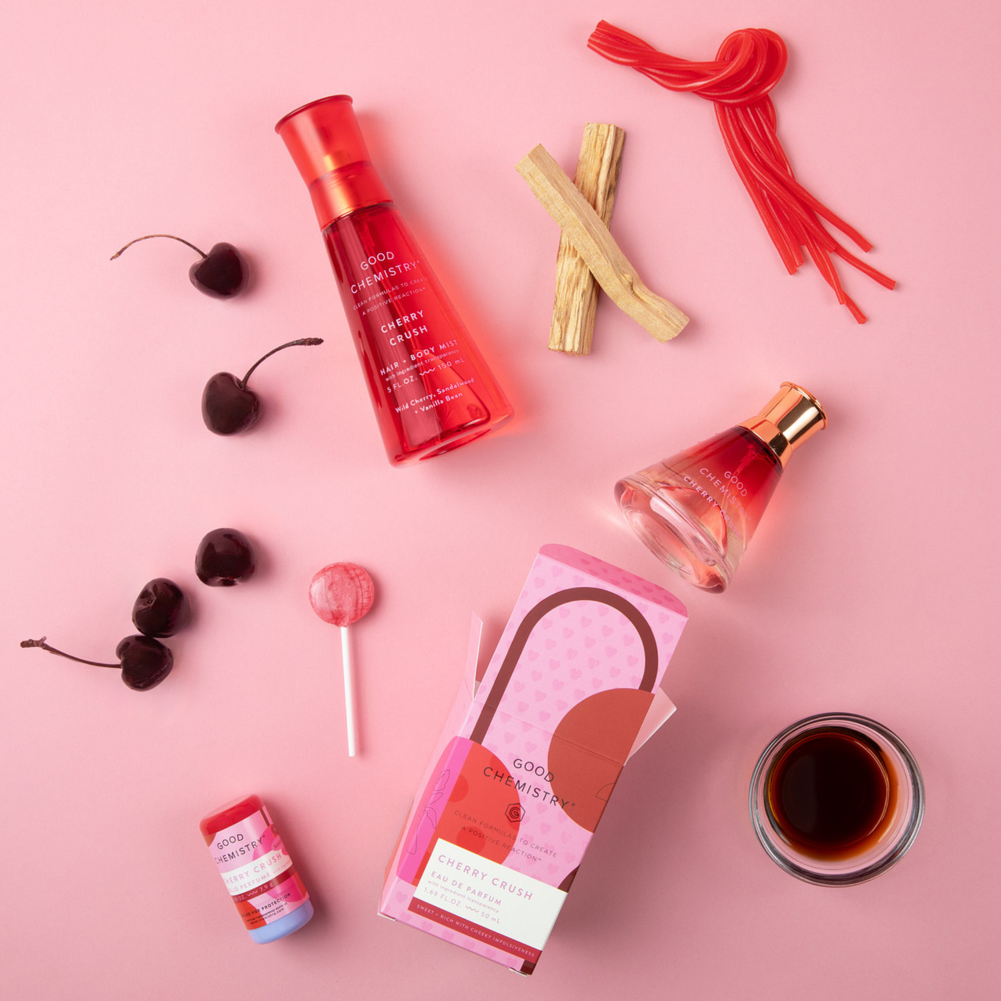  'Good Chemistry' Cherry Crush product ingredient portfolio on a pink background with cherries, lollipop, and other items.