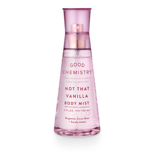 A pink spray bottle labeled 'GOOD CHEMISTRY NOT THAT VANILLA BODY MIST' with ingredient notes of bergamot, cocoa bean, and amber.
