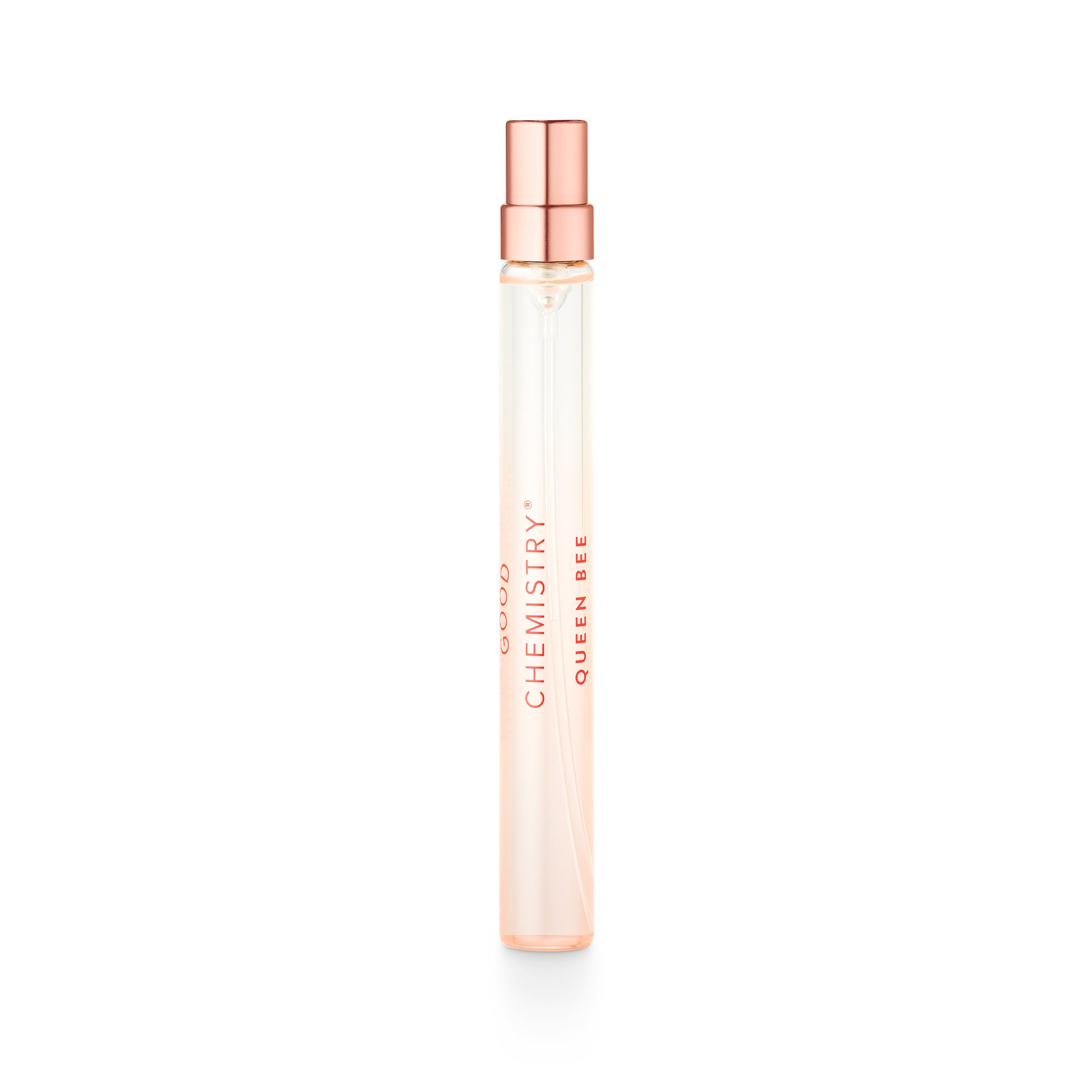 Small perfume bottle with a rose gold cap on a white background