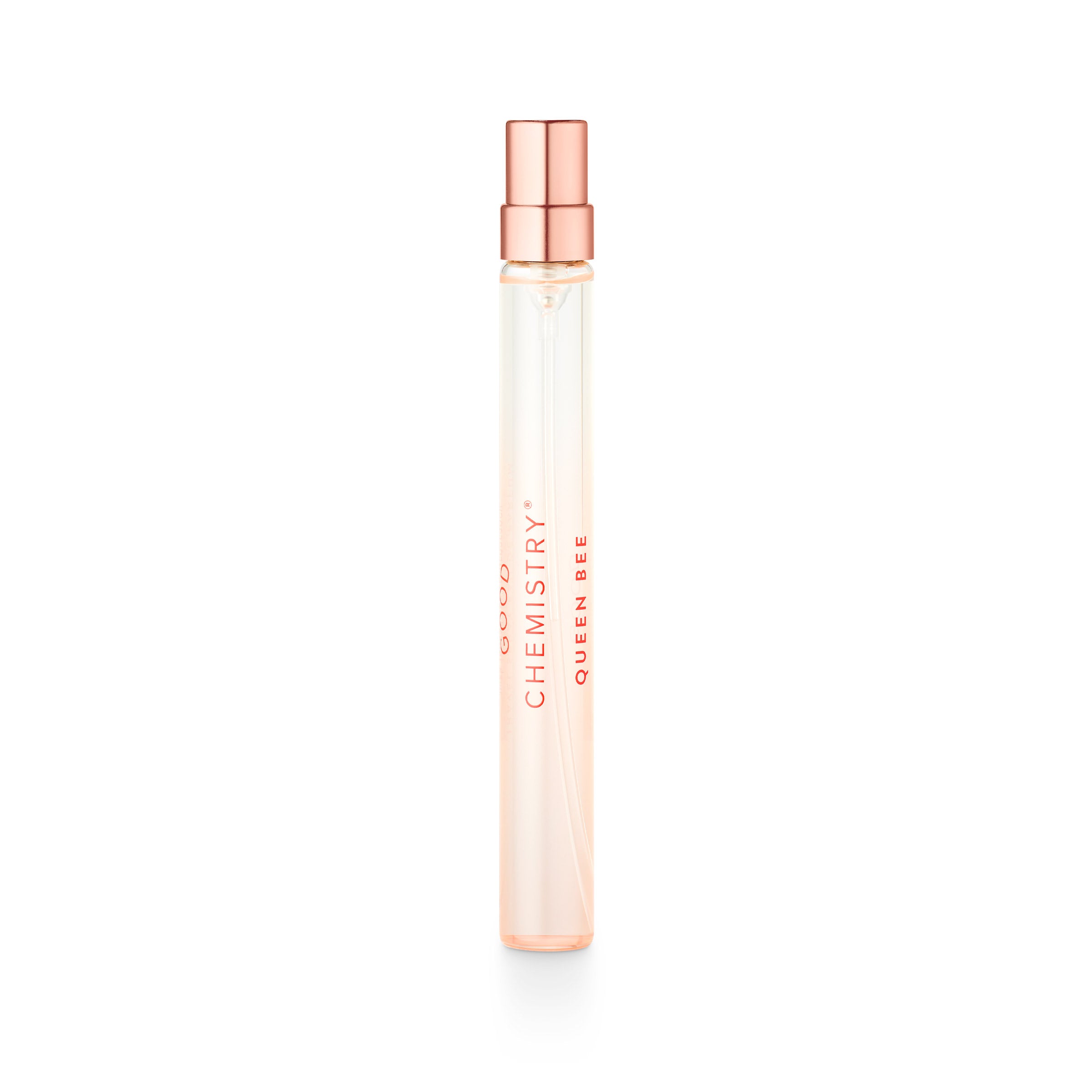 Small perfume bottle with a rose gold cap on a white background