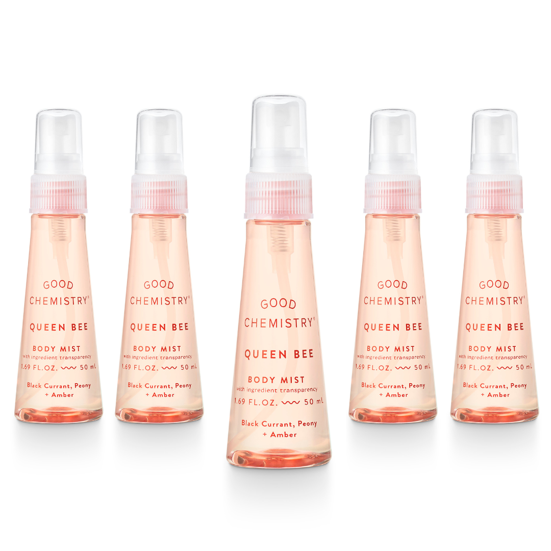 Five bottles of Queen Bee mini body mist on a white background
