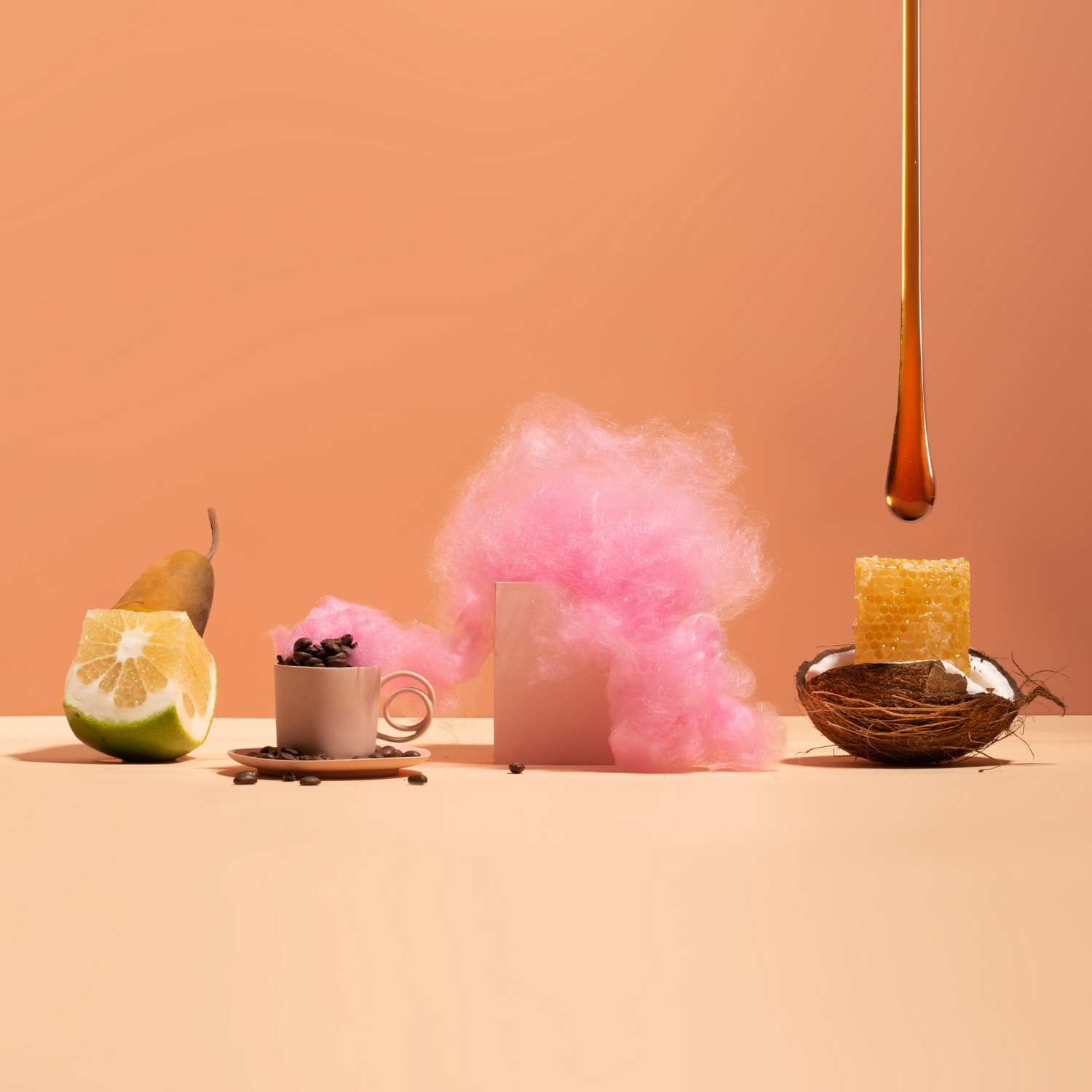 Coffee Cloud ingredient queues, featuring lime, coffee mug, coconut, espresso and honeycomb on a peach background