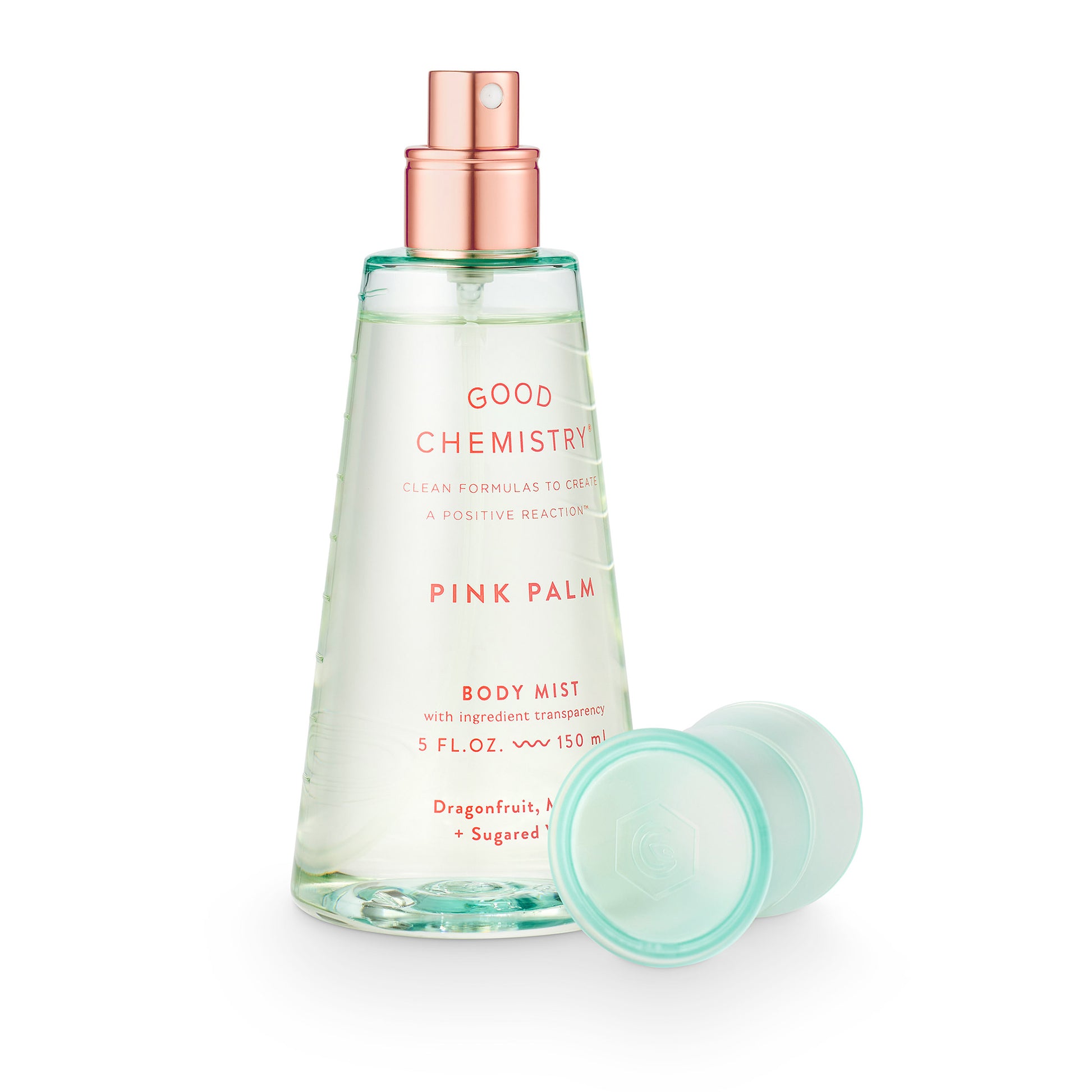 light green bottle of 'Good Chemistry Pink Palm" body spray on a white background
