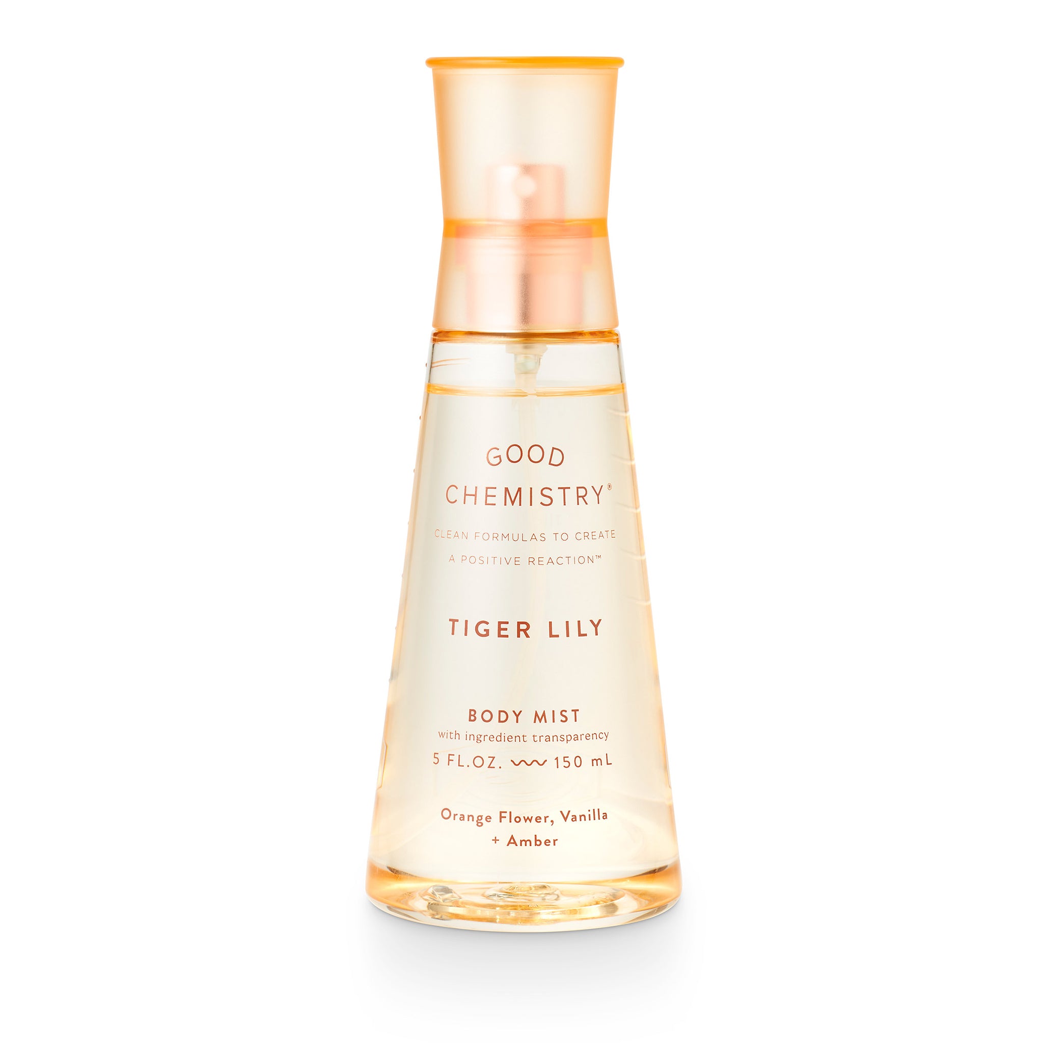 A clear spray bottle labeled 'GOOD CHEMISTRY' with 'TIGER LILY' written on it, containing a yellow-colored body mist.